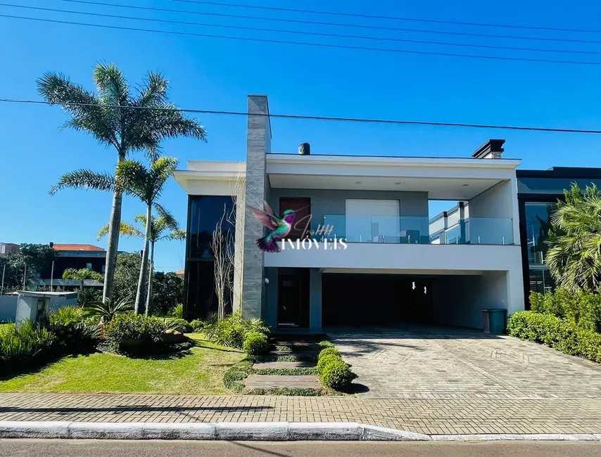 Foto 1 de Casa com 5 quartos à venda, 441m2 em Capao Da Canoa - RS