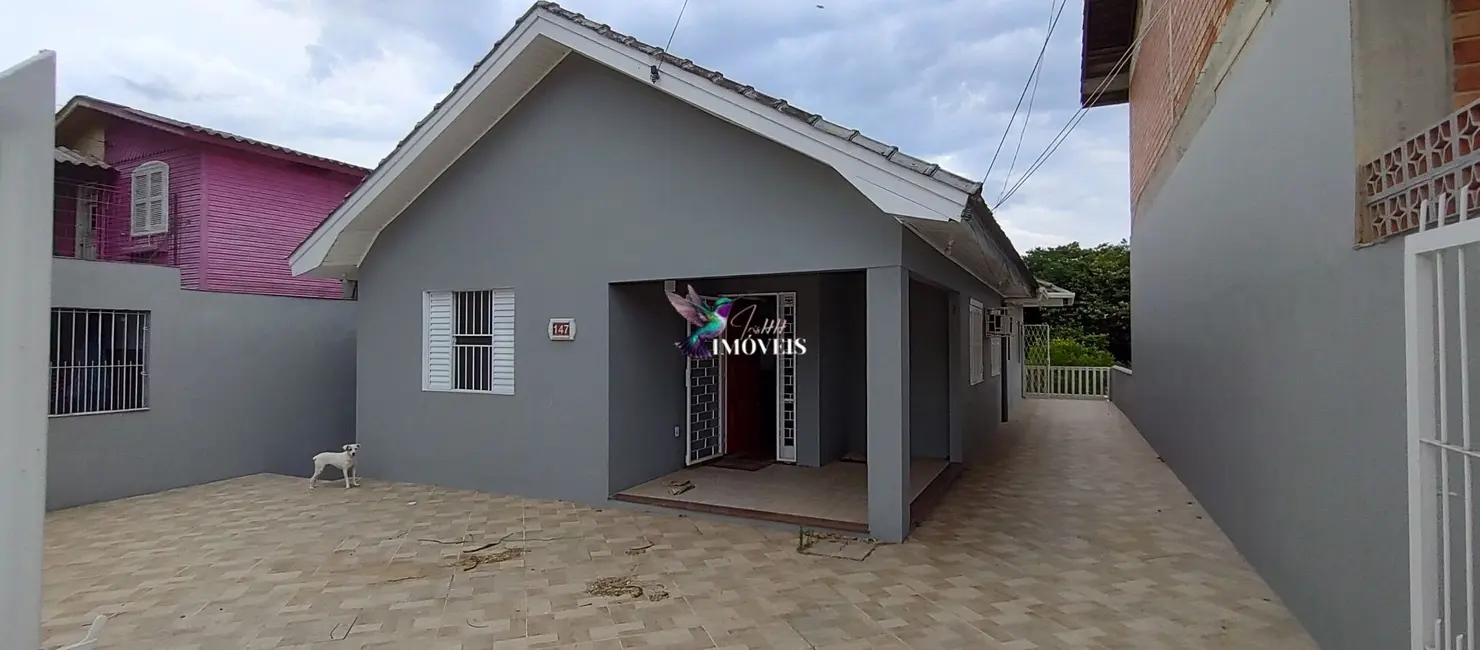 Foto 1 de Casa com 3 quartos à venda, 105m2 em Guaiba - RS