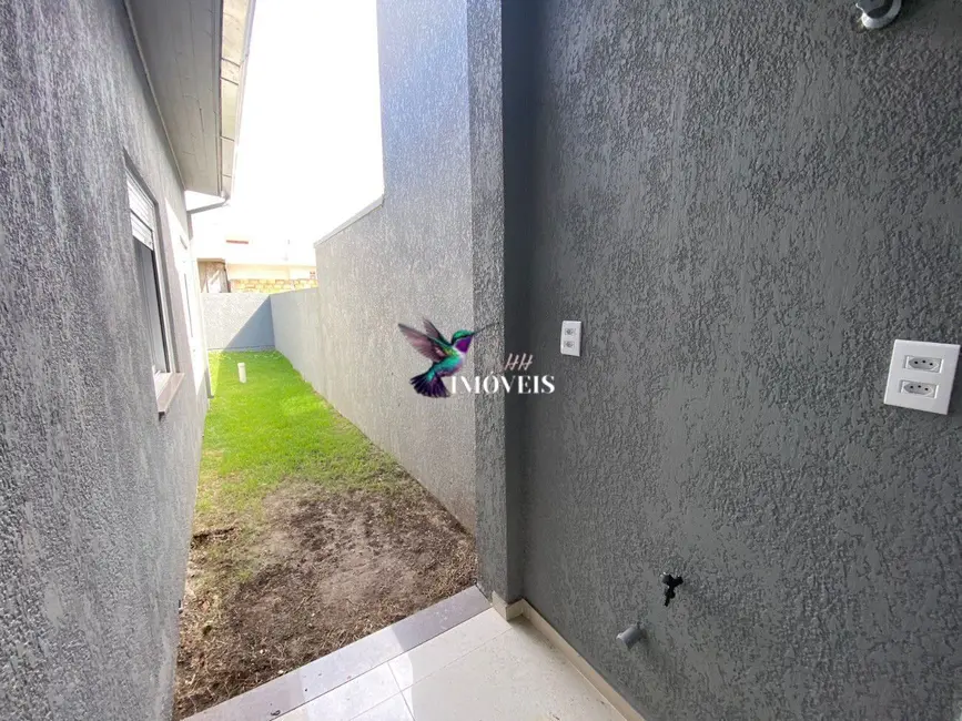 Casa com 2 quartos à venda, 65m2 em Capao Da Canoa - RS - imagem 5 Foto 5 de Casa com 2 quartos à venda, 65m2 em Capao Da Canoa - RS