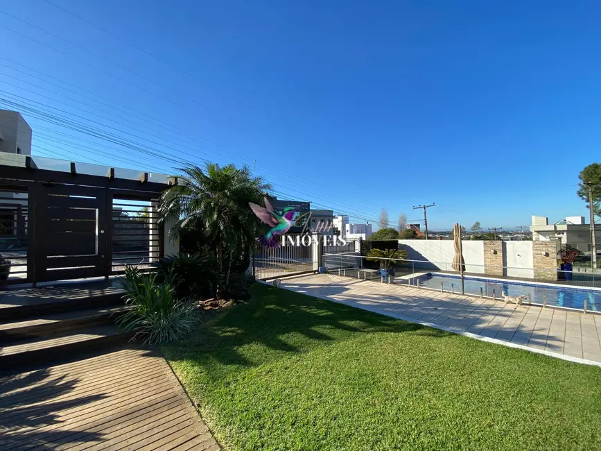 Casa com 4 quartos à venda, 204m2 em Torres - RS - imagem 8 Foto 8 de Casa com 4 quartos à venda, 204m2 em Torres - RS