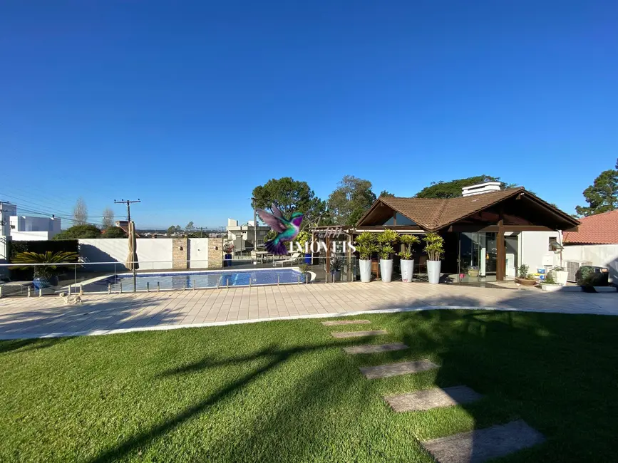 Casa com 4 quartos à venda, 204m2 em Torres - RS - imagem 7 Foto 7 de Casa com 4 quartos à venda, 204m2 em Torres - RS