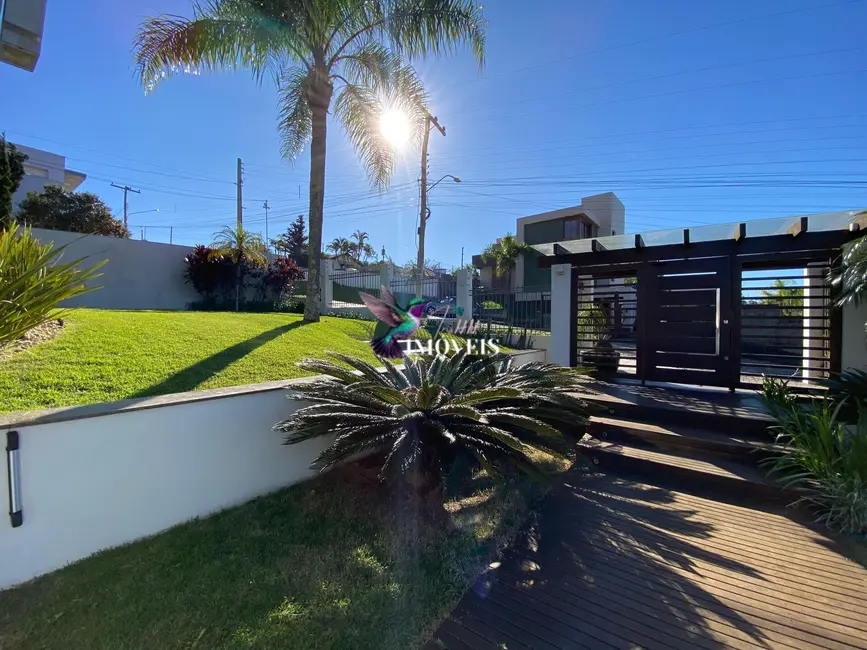 Casa com 4 quartos à venda, 204m2 em Torres - RS - imagem 9 Foto 9 de Casa com 4 quartos à venda, 204m2 em Torres - RS