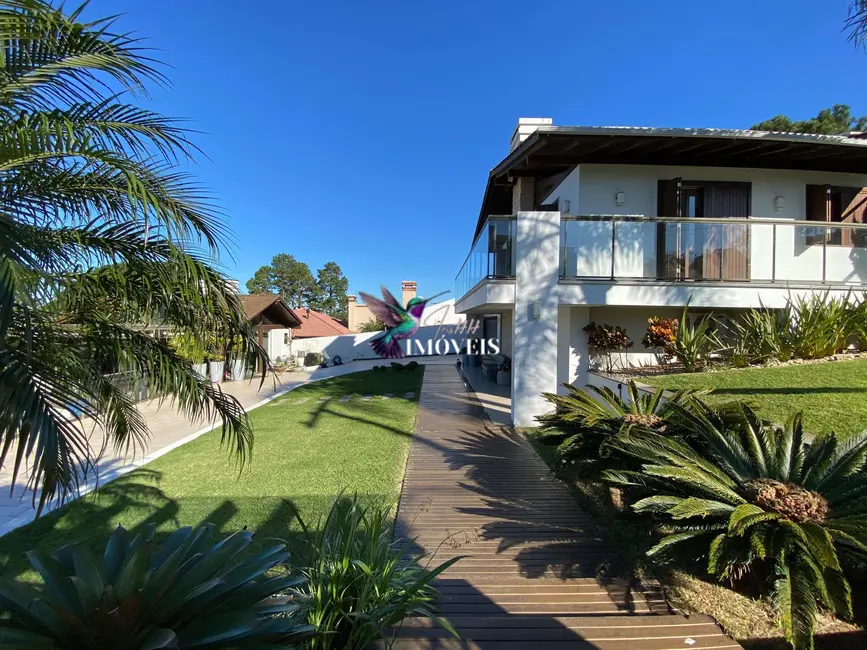 Casa com 4 quartos à venda, 204m2 em Torres - RS - imagem 5 Foto 5 de Casa com 4 quartos à venda, 204m2 em Torres - RS