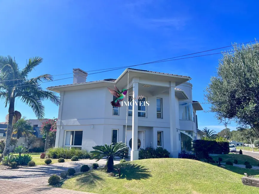 Foto 2 de Casa com 4 quartos à venda, 390m2 em Capao Da Canoa - RS