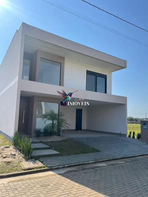 Foto 1 de Casa com 3 quartos à venda, 180m2 em Eldorado Do Sul - RS