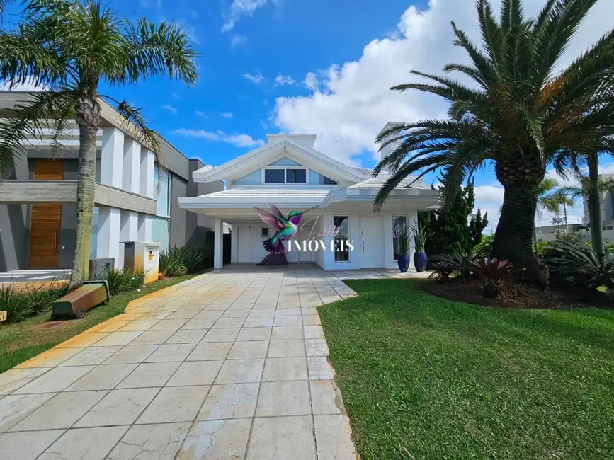 Foto 1 de Casa de Condomínio com 4 quartos à venda, 327m2 em Centro, Xangri-lá - RS