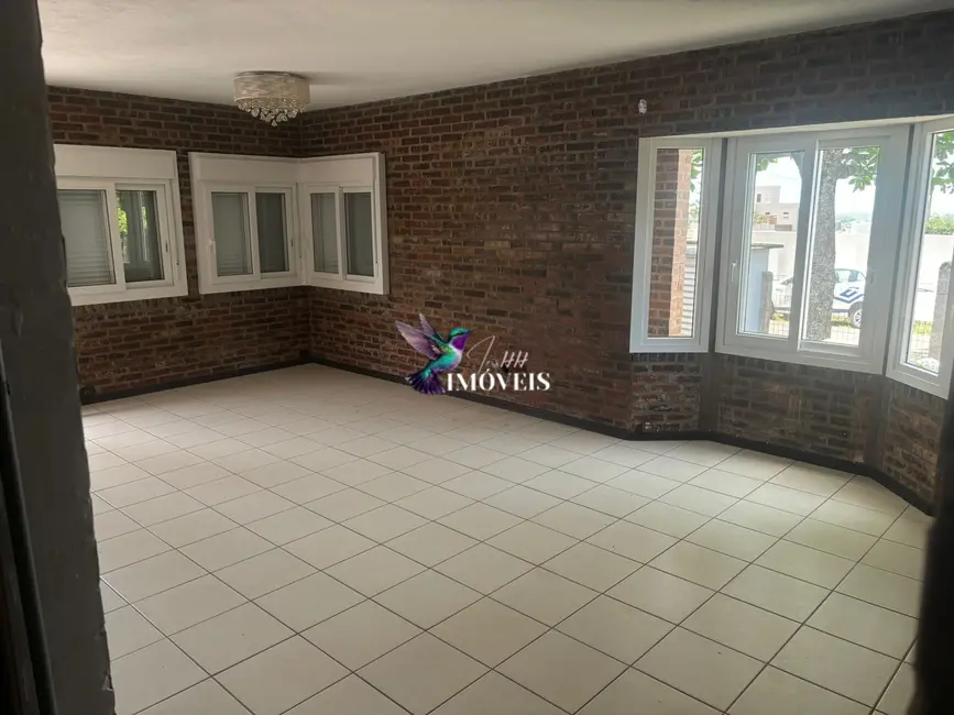 Casa com 3 quartos à venda, 126m2 em Centro, Torres - RS - imagem 7 Foto 7 de Casa com 3 quartos à venda, 126m2 em Centro, Torres - RS