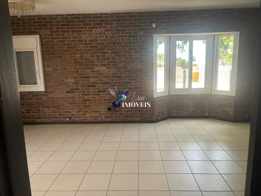 Casa com 3 quartos à venda, 126m2 em Centro, Torres - RS - imagem 8 Foto 8 de Casa com 3 quartos à venda, 126m2 em Centro, Torres - RS