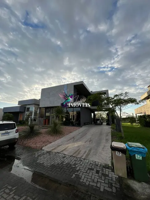 Foto 1 de Casa de Condomínio com 3 quartos à venda, 275m2 em Capao Da Canoa - RS