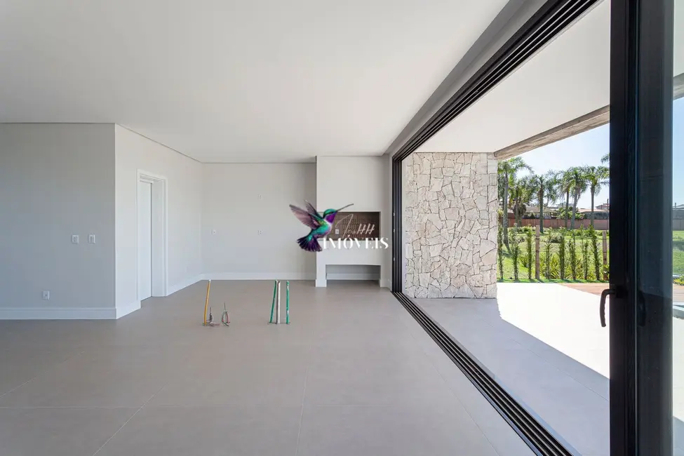 Casa de Condomínio com 4 quartos à venda, 359m2 em Centro, Torres - RS - imagem 9 Foto 9 de Casa de Condomínio com 4 quartos à venda, 359m2 em Centro, Torres - RS