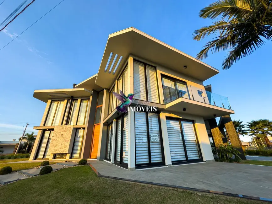 Casa de Condomínio com 5 quartos à venda, 591m2 em Torres - RS - imagem 1 Foto 1 de Casa de Condomínio com 5 quartos à venda, 591m2 em Torres - RS