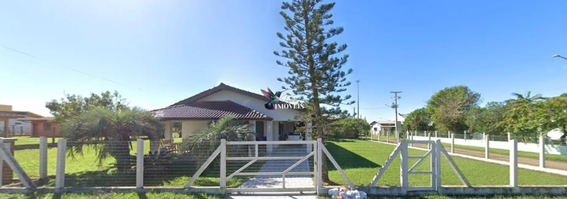 Foto 1 de Casa com 6 quartos à venda, 264m2 em Torres - RS