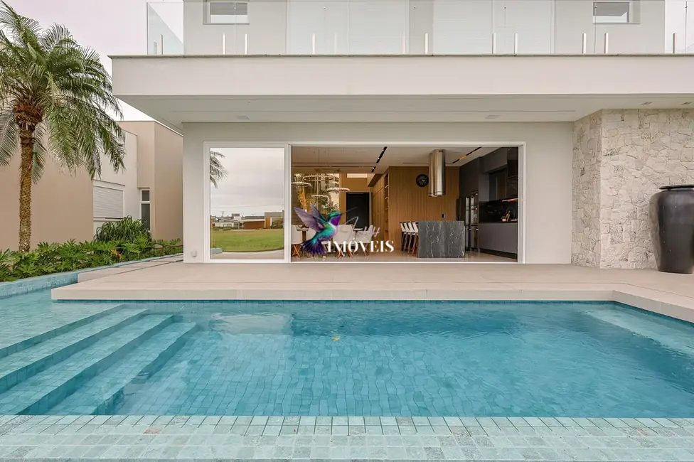 Casa com 4 quartos à venda em Torres - RS - imagem 4 Foto 4 de Casa com 4 quartos à venda em Torres - RS