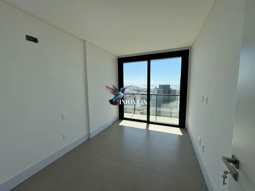 Foto 6 de Apartamento com 3 quartos à venda, 114m2 em Torres - RS
