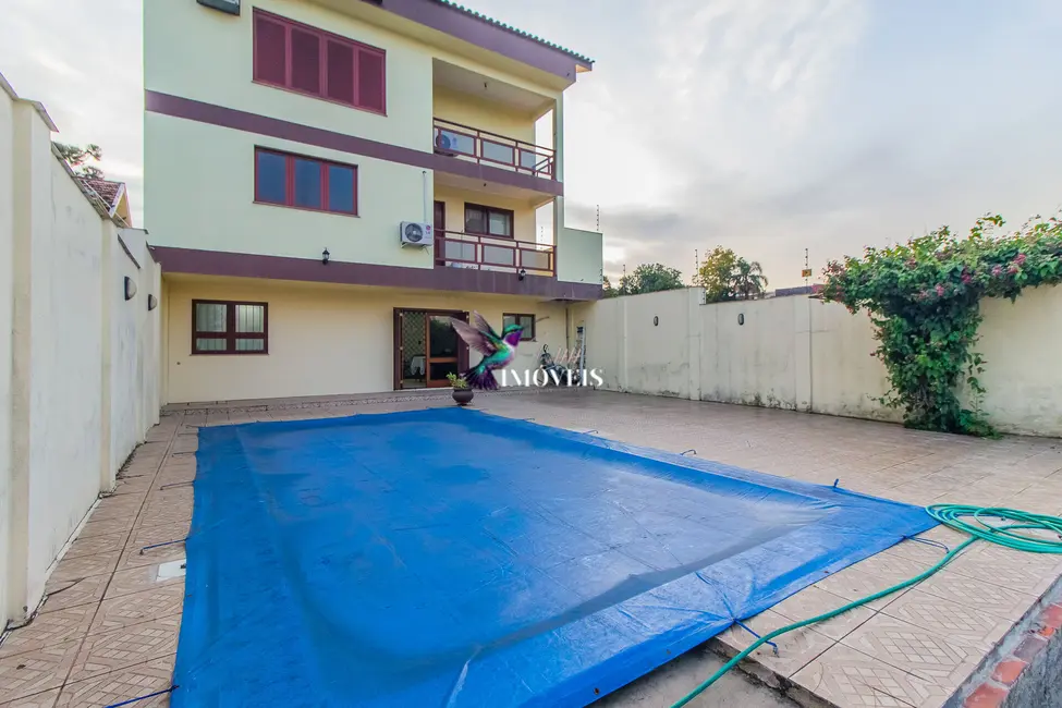 Foto 7 de Casa com 3 quartos à venda, 360m2 em Nossa Senhora das Graças, Canoas - RS