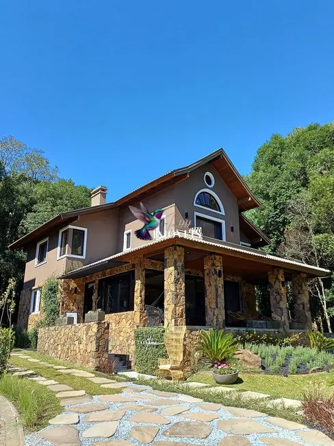 Foto 2 de Casa com 4 quartos à venda, 282m2 em Centro, Gramado - RS