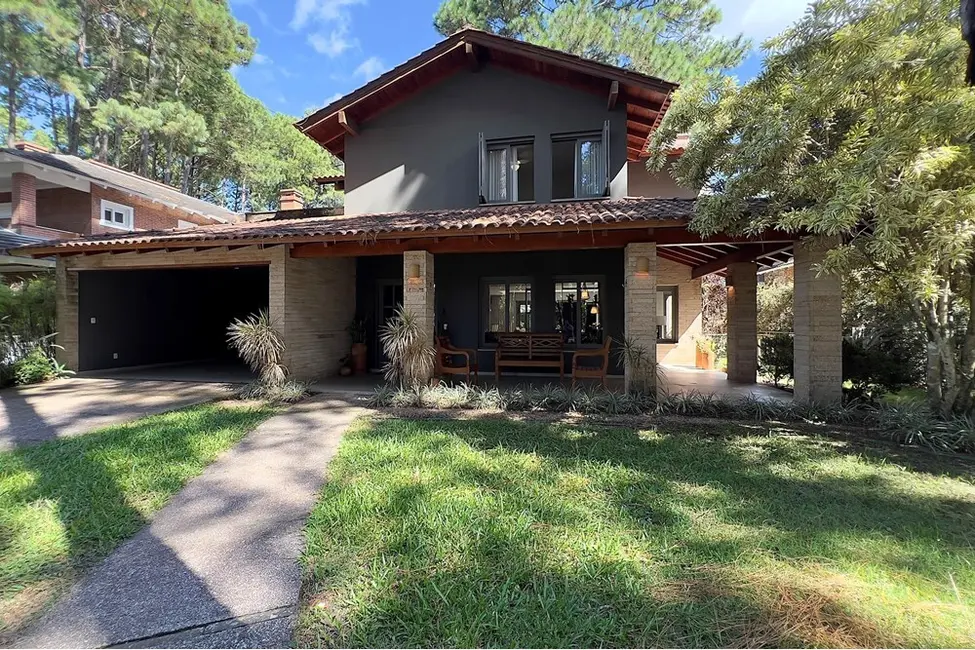 Foto 1 de Casa de Condomínio com 4 quartos à venda, 290m2 em Xangri-lá - RS