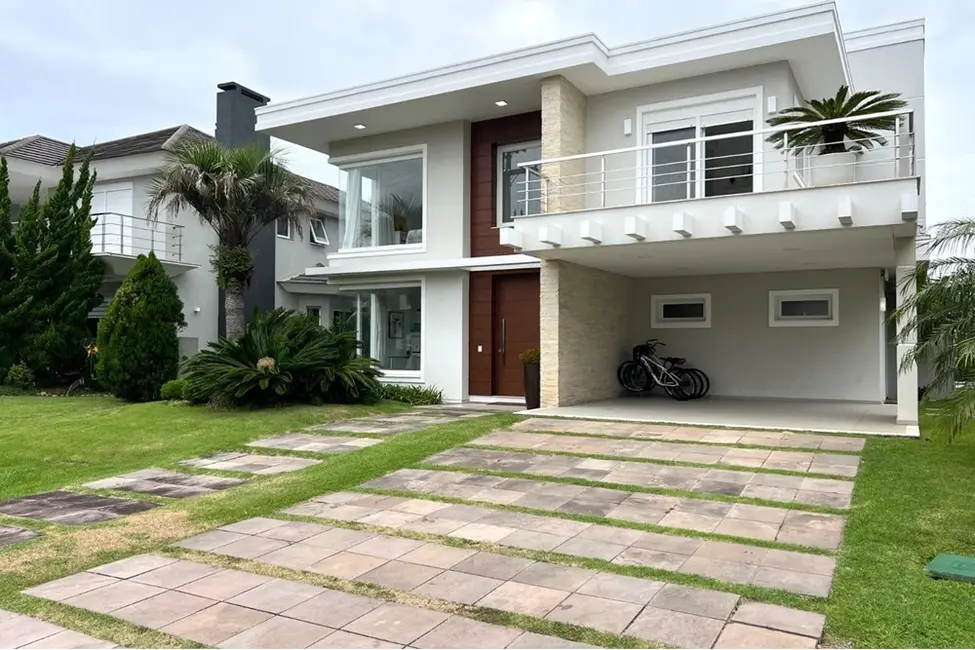 Casa de Condomínio com 5 quartos à venda, 413m2 em Xangri-lá - RS - imagem 1 Foto 1 de Casa de Condomínio com 5 quartos à venda, 413m2 em Xangri-lá - RS