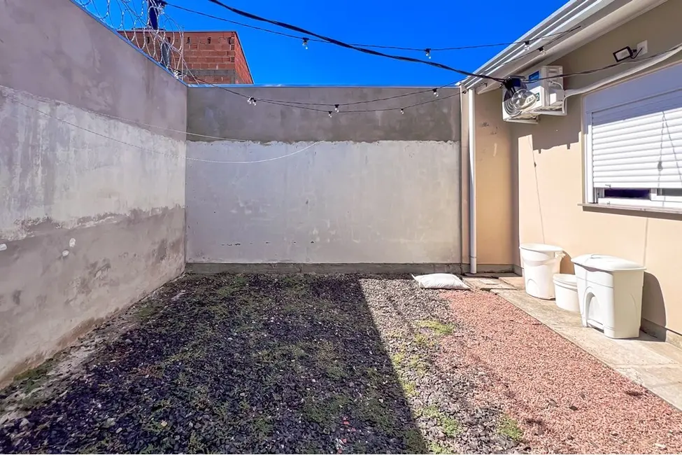 Casa com 2 quartos à venda, 54m2 em Olaria, Canoas - RS - imagem 7 Foto 7 de Casa com 2 quartos à venda, 54m2 em Olaria, Canoas - RS