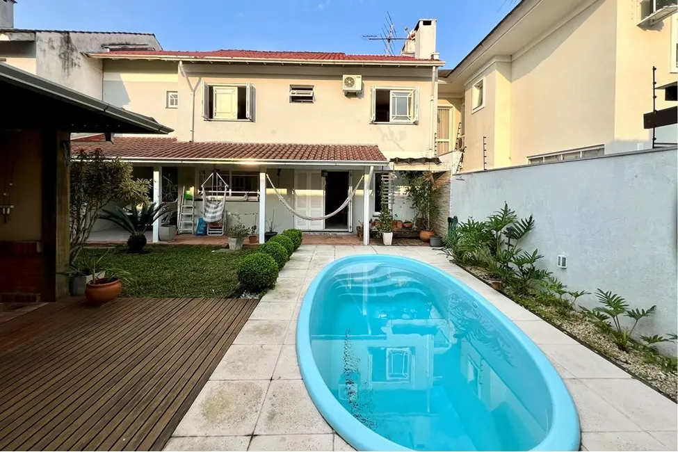 Casa com 4 quartos à venda, 243m2 em Canoas - RS - imagem 8 Foto 8 de Casa com 4 quartos à venda, 243m2 em Canoas - RS