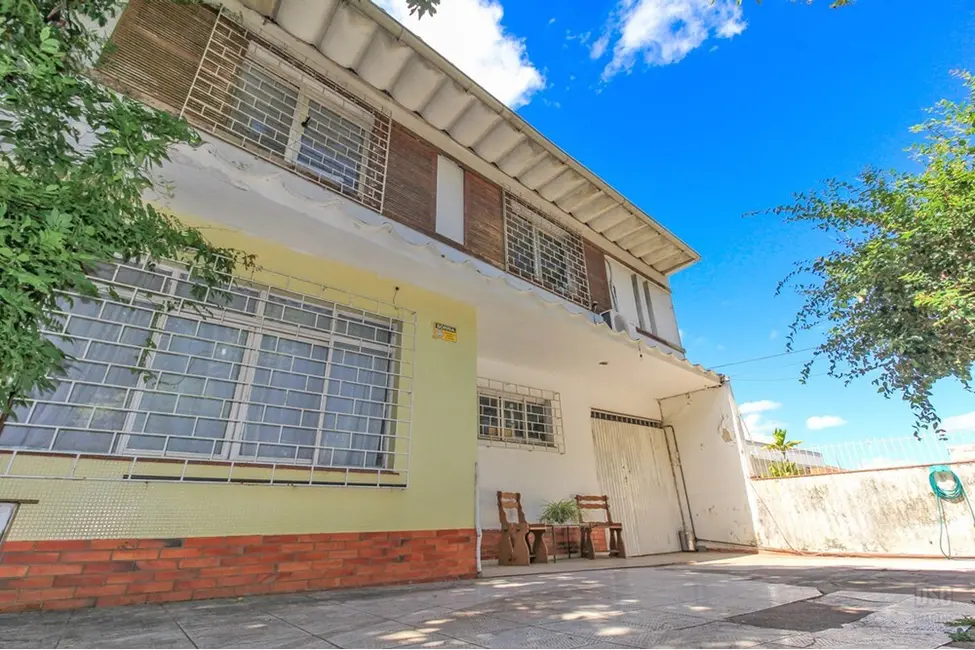 Foto 1 de Casa com 5 quartos à venda, 254m2 em Três Figueiras, Porto Alegre - RS