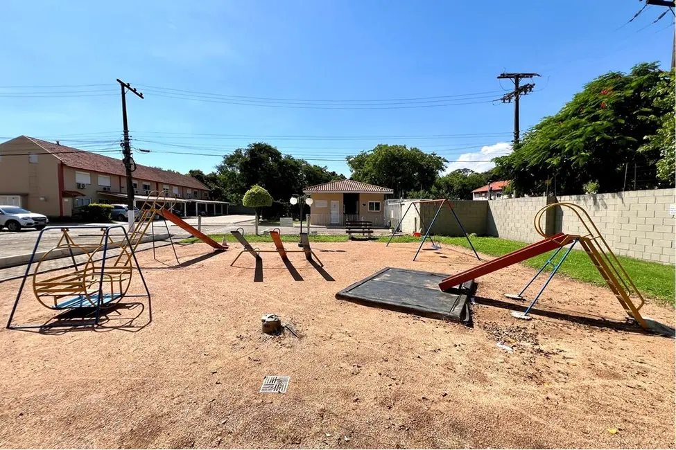 Casa com 2 quartos à venda, 103m2 em Rio Branco, Canoas - RS - imagem 6 Foto 6 de Casa com 2 quartos à venda, 103m2 em Rio Branco, Canoas - RS