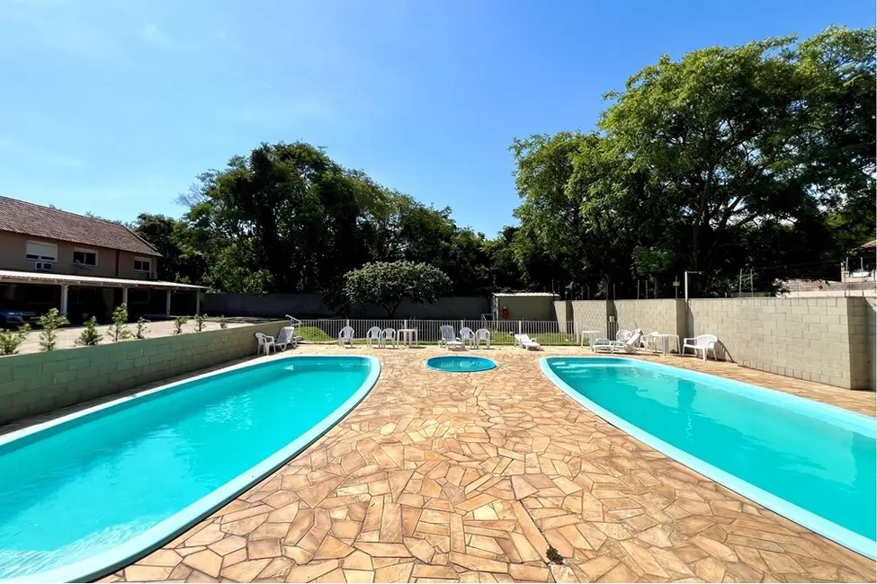 Casa com 2 quartos à venda, 103m2 em Rio Branco, Canoas - RS - imagem 4 Foto 4 de Casa com 2 quartos à venda, 103m2 em Rio Branco, Canoas - RS