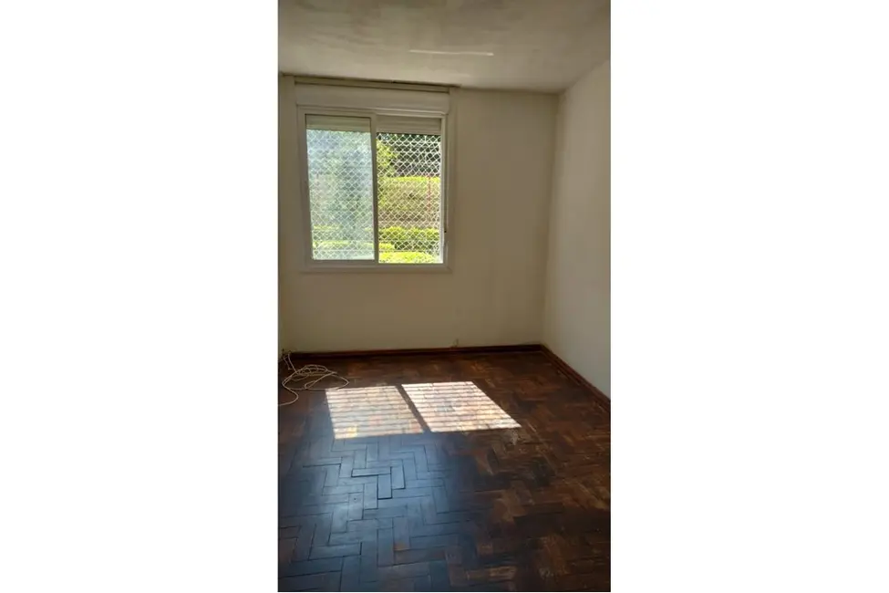 Apartamento com 2 quartos à venda, 53m2 em Santo Antônio, Porto Alegre - RS - imagem 6 Foto 6 de Apartamento com 2 quartos à venda, 53m2 em Santo Antônio, Porto Alegre - RS