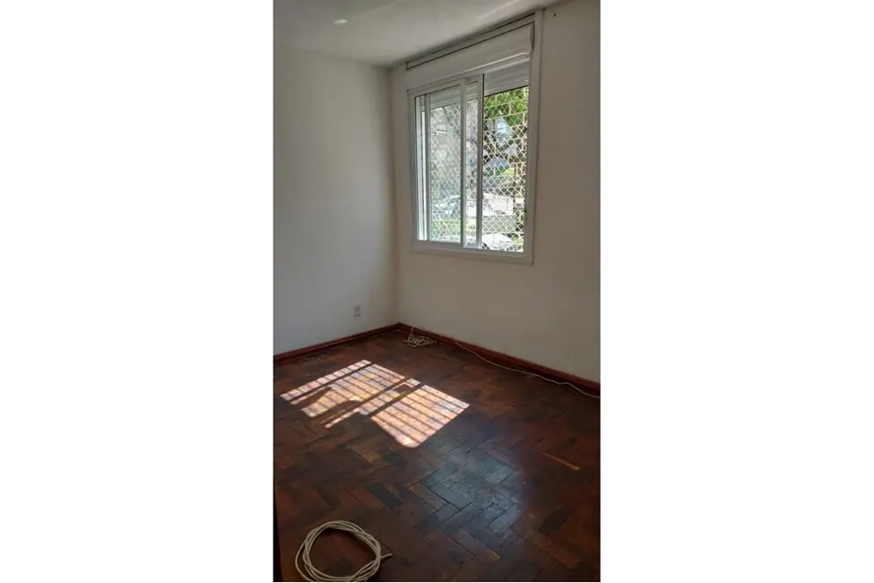 Apartamento com 2 quartos à venda, 53m2 em Santo Antônio, Porto Alegre - RS - imagem 1 Foto 1 de Apartamento com 2 quartos à venda, 53m2 em Santo Antônio, Porto Alegre - RS