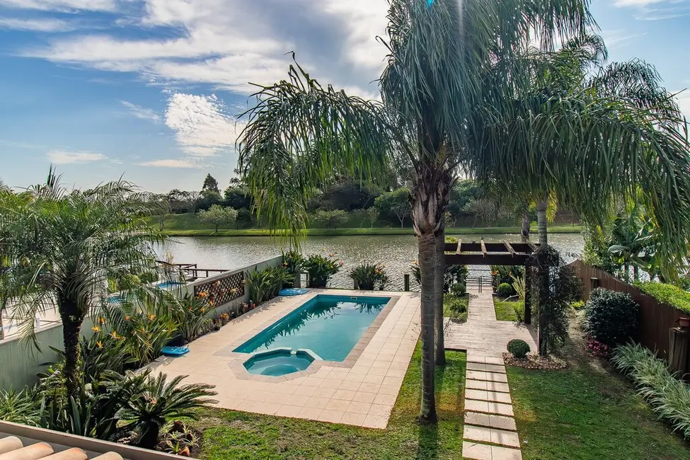Casa de Condomínio com 4 quartos à venda, 387m2 em Belém Novo, Porto Alegre - RS - imagem 1 Foto 1 de Casa de Condomínio com 4 quartos à venda, 387m2 em Belém Novo, Porto Alegre - RS