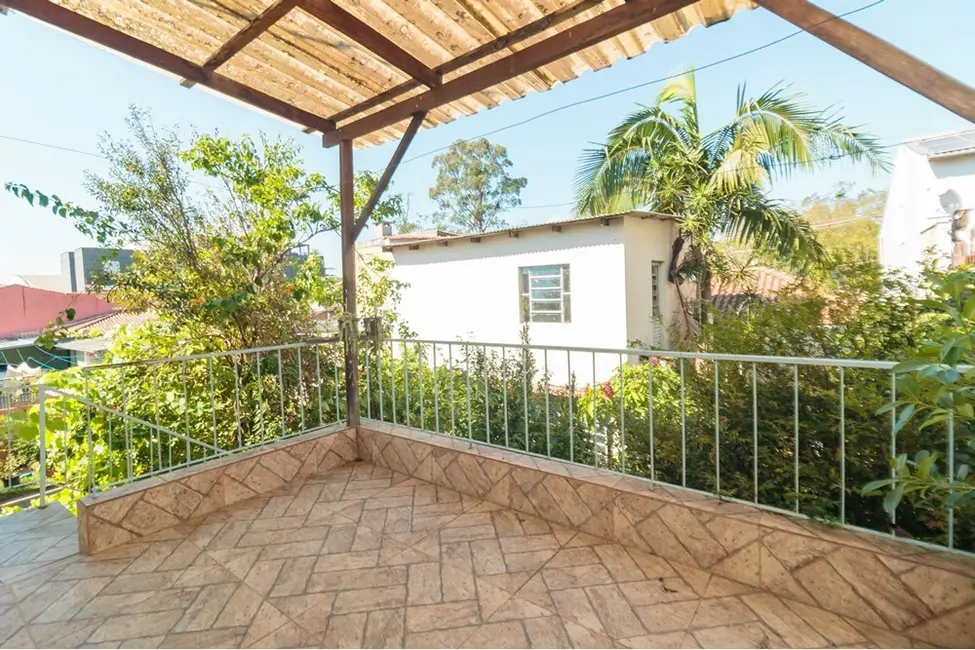 Foto 2 de Casa com 3 quartos à venda, 195m2 em Santa Maria Goretti, Porto Alegre - RS
