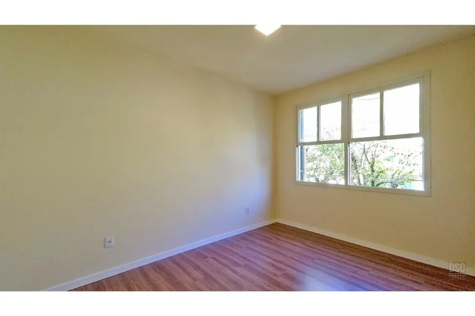 Foto 2 de Apartamento com 2 quartos à venda, 55m2 em Santa Tereza, Porto Alegre - RS