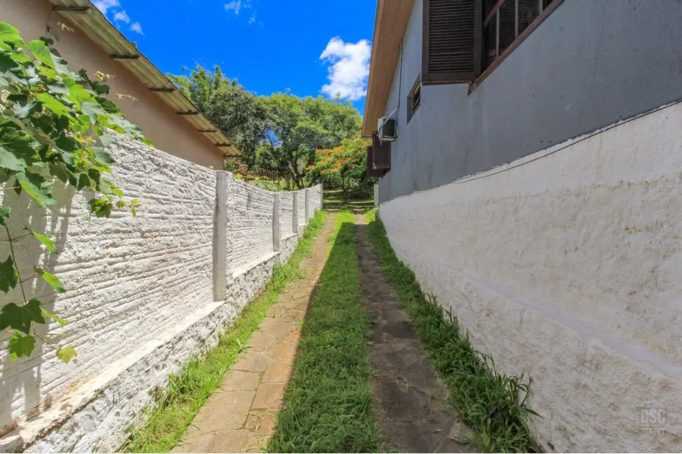 Casa com 4 quartos à venda, 173m2 em Espírito Santo, Porto Alegre - RS - imagem 6 Foto 6 de Casa com 4 quartos à venda, 173m2 em Espírito Santo, Porto Alegre - RS