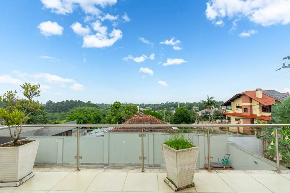 Casa de Condomínio com 4 quartos à venda, 326m2 em Nossa Senhora das Graças, Canoas - RS - imagem 6 Foto 6 de Casa de Condomínio com 4 quartos à venda, 326m2 em Nossa Senhora das Graças, Canoas - RS