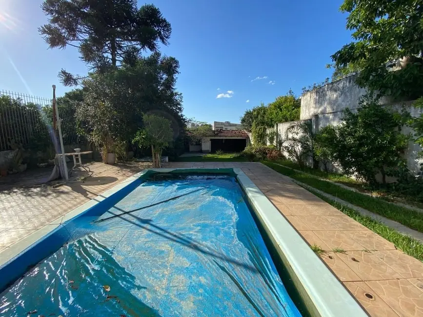 Foto 1 de Casa com 4 quartos à venda, 315m2 em Tristeza, Porto Alegre - RS