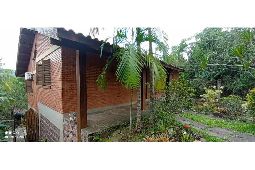 Foto 1 de Casa com 2 quartos à venda, 210m2 em Vila Nova, Porto Alegre - RS