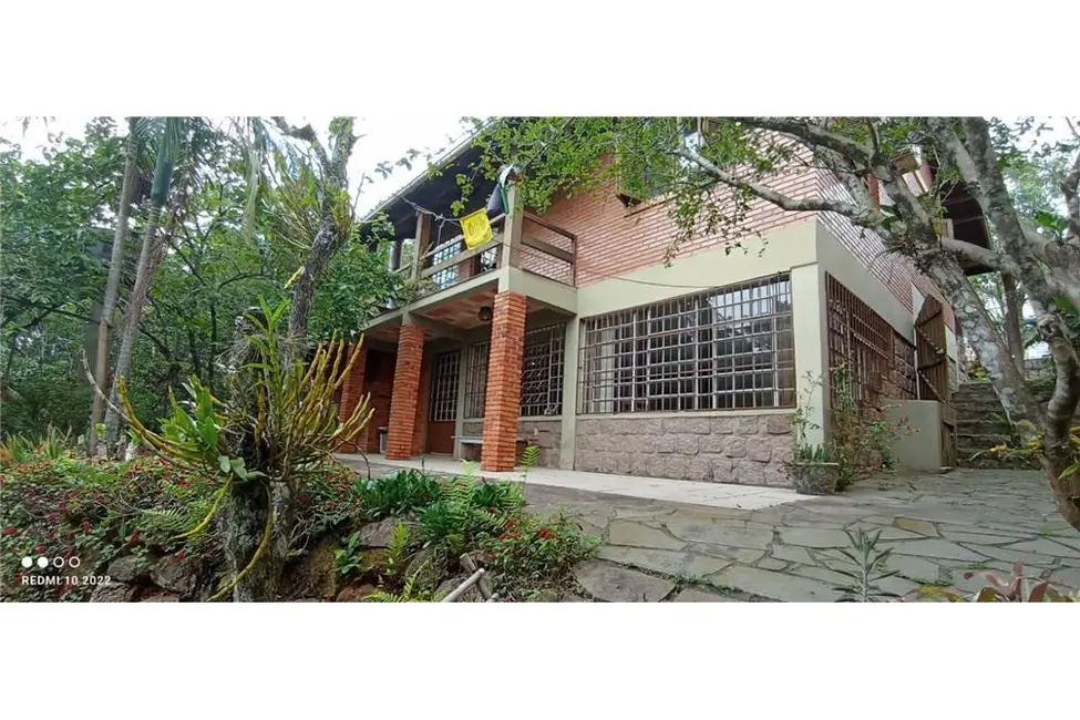 Foto 8 de Casa com 2 quartos à venda, 210m2 em Vila Nova, Porto Alegre - RS