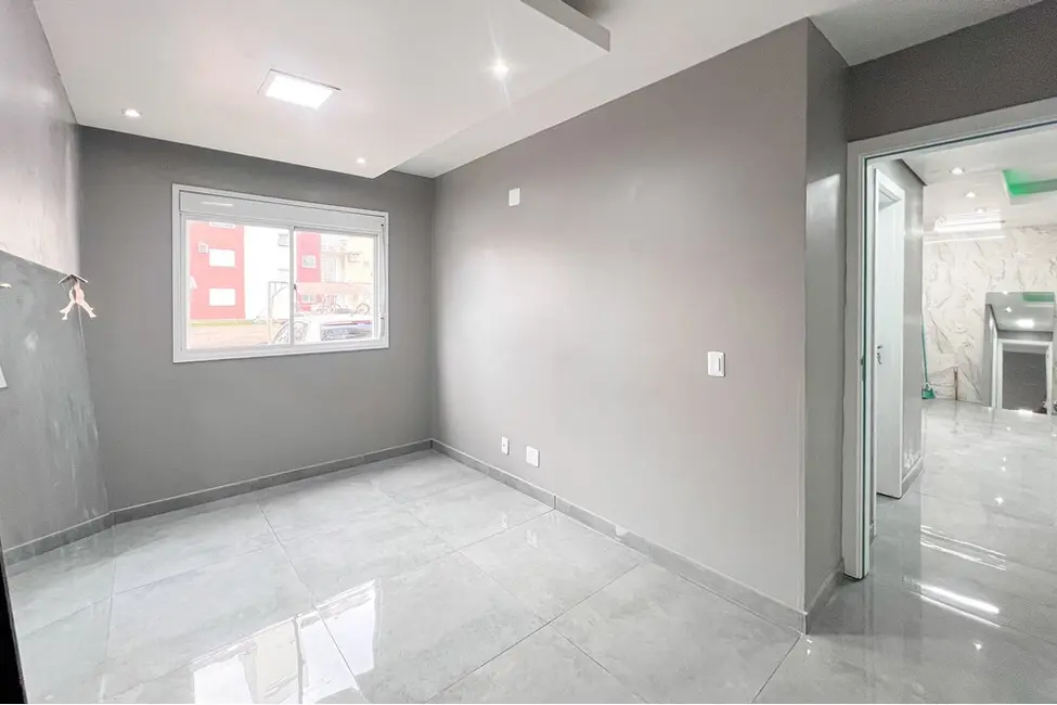 Apartamento com 2 quartos à venda, 52m2 em Fátima, Canoas - RS - imagem 9 Foto 9 de Apartamento com 2 quartos à venda, 52m2 em Fátima, Canoas - RS