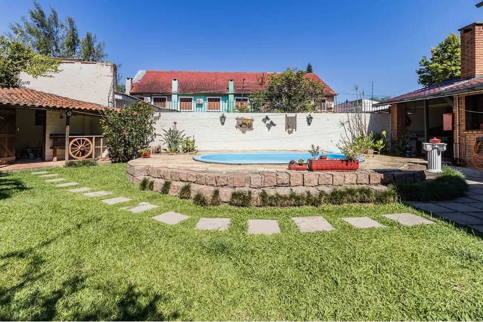 Casa com 3 quartos à venda, 235m2 em Guarujá, Porto Alegre - RS - imagem 4 Foto 4 de Casa com 3 quartos à venda, 235m2 em Guarujá, Porto Alegre - RS