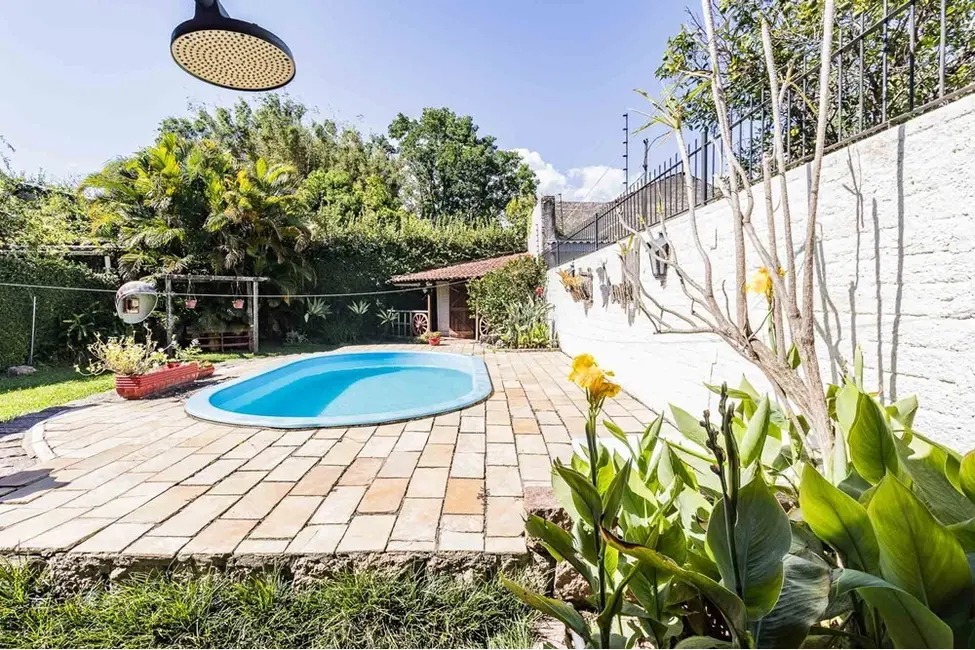 Casa com 3 quartos à venda, 235m2 em Guarujá, Porto Alegre - RS - imagem 8 Foto 8 de Casa com 3 quartos à venda, 235m2 em Guarujá, Porto Alegre - RS