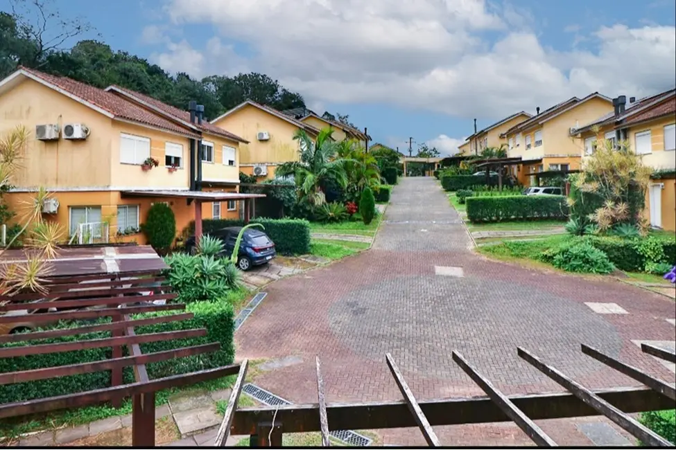 Foto 3 de Casa de Condomínio com 3 quartos à venda, 230m2 em Mário Quintana, Porto Alegre - RS