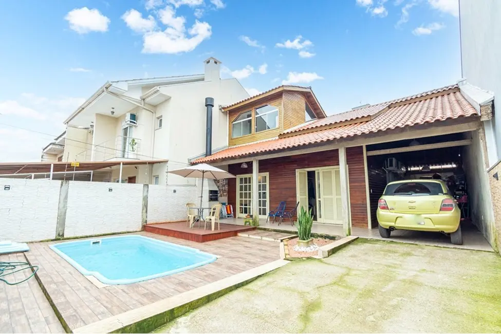 Casa com 3 quartos à venda, 125m2 em Igara, Canoas - RS - imagem 5 Foto 5 de Casa com 3 quartos à venda, 125m2 em Igara, Canoas - RS