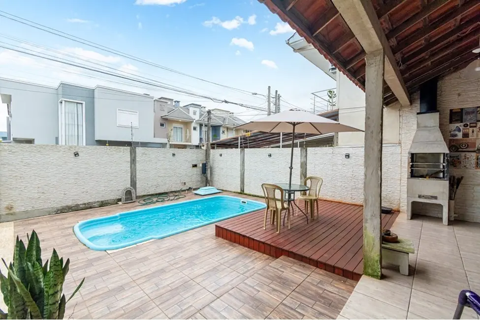 Casa com 3 quartos à venda, 125m2 em Igara, Canoas - RS - imagem 6 Foto 6 de Casa com 3 quartos à venda, 125m2 em Igara, Canoas - RS