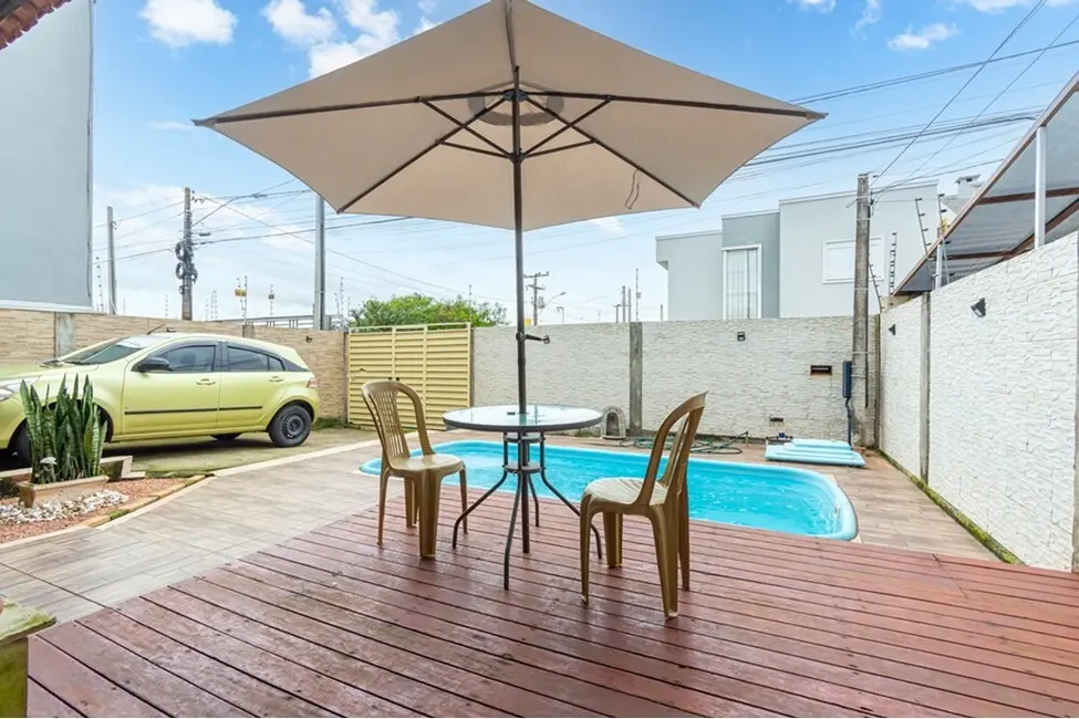 Casa com 3 quartos à venda, 125m2 em Igara, Canoas - RS - imagem 7 Foto 7 de Casa com 3 quartos à venda, 125m2 em Igara, Canoas - RS