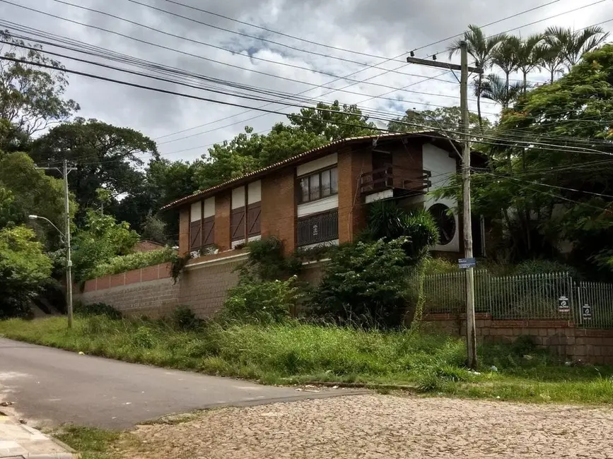 Foto 1 de Casa com 3 quartos à venda, 300m2 em Santa Tereza, Porto Alegre - RS