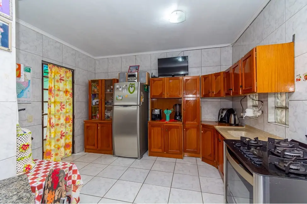 Casa com 2 quartos à venda, 102m2 em Igara, Canoas - RS - imagem 5 Foto 5 de Casa com 2 quartos à venda, 102m2 em Igara, Canoas - RS