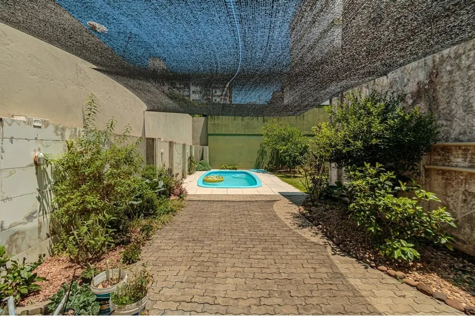 Casa com 3 quartos à venda, 177m2 em Menino Deus, Porto Alegre - RS - imagem 2 Foto 2 de Casa com 3 quartos à venda, 177m2 em Menino Deus, Porto Alegre - RS