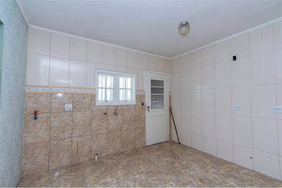Casa com 4 quartos à venda, 113m2 em Harmonia, Canoas - RS - imagem 7 Foto 7 de Casa com 4 quartos à venda, 113m2 em Harmonia, Canoas - RS