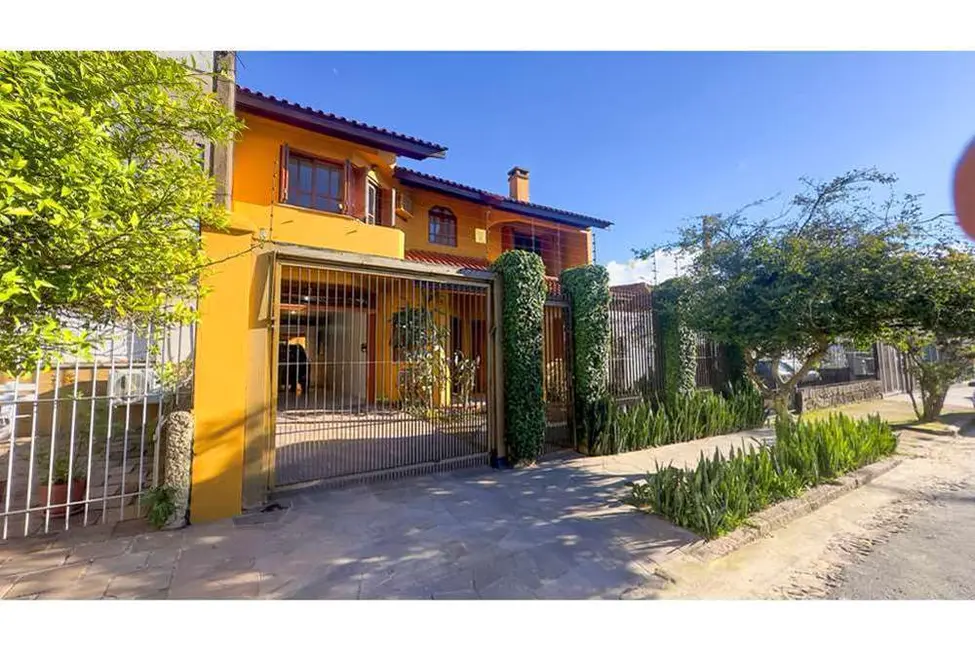 Foto 1 de Casa com 4 quartos à venda, 307m2 em Partenon, Porto Alegre - RS