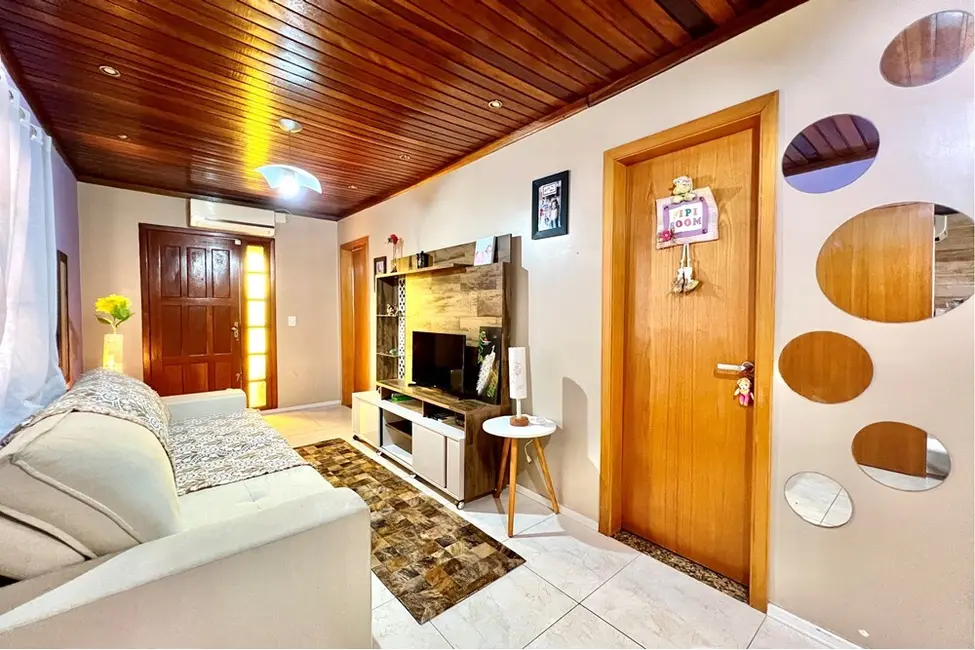 Casa com 4 quartos à venda, 200m2 em Estância Velha, Canoas - RS - imagem 3 Foto 3 de Casa com 4 quartos à venda, 200m2 em Estância Velha, Canoas - RS